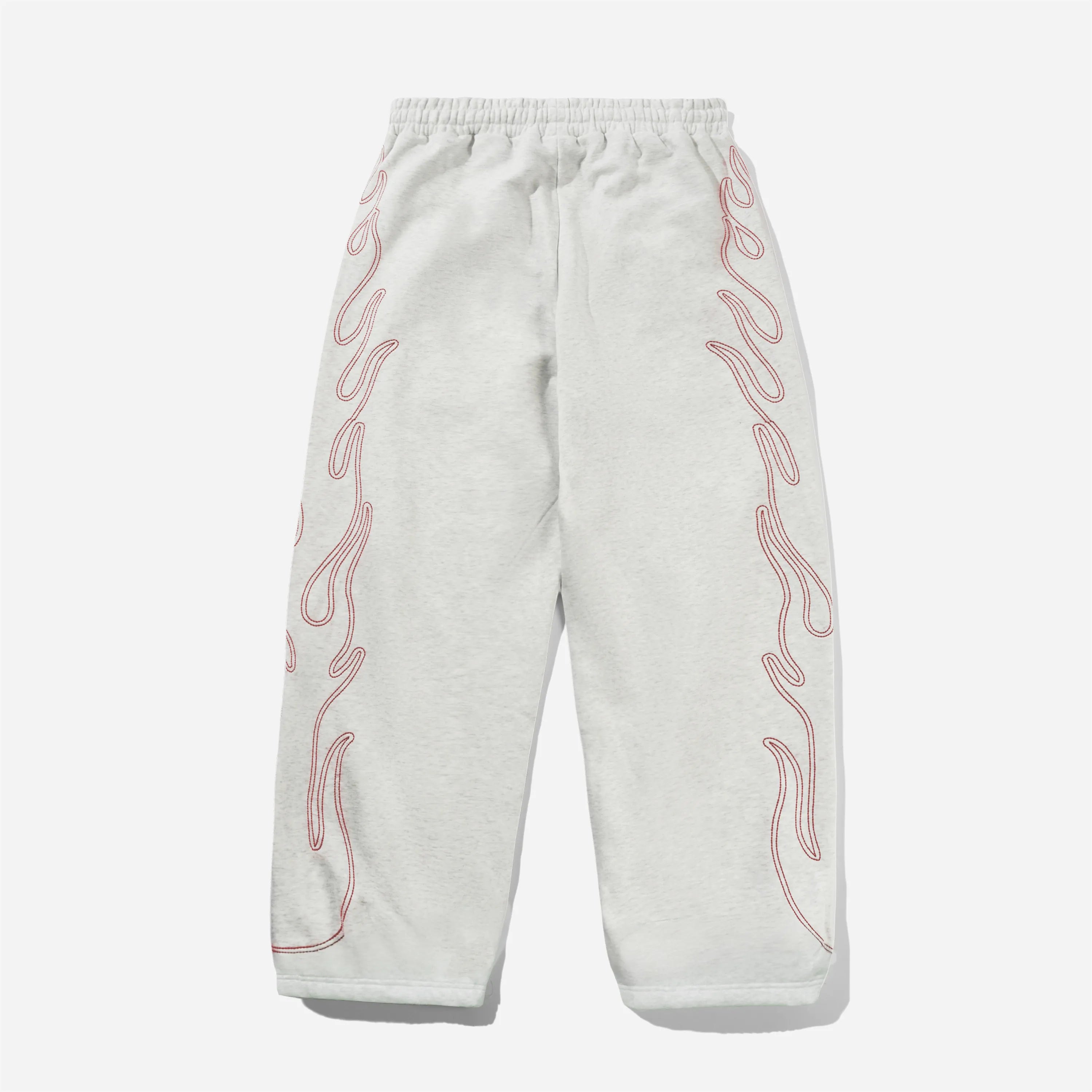 Ash grey Butter Goods Flame Fleece Pants featuring a baggy fit and large red flame embroidery.