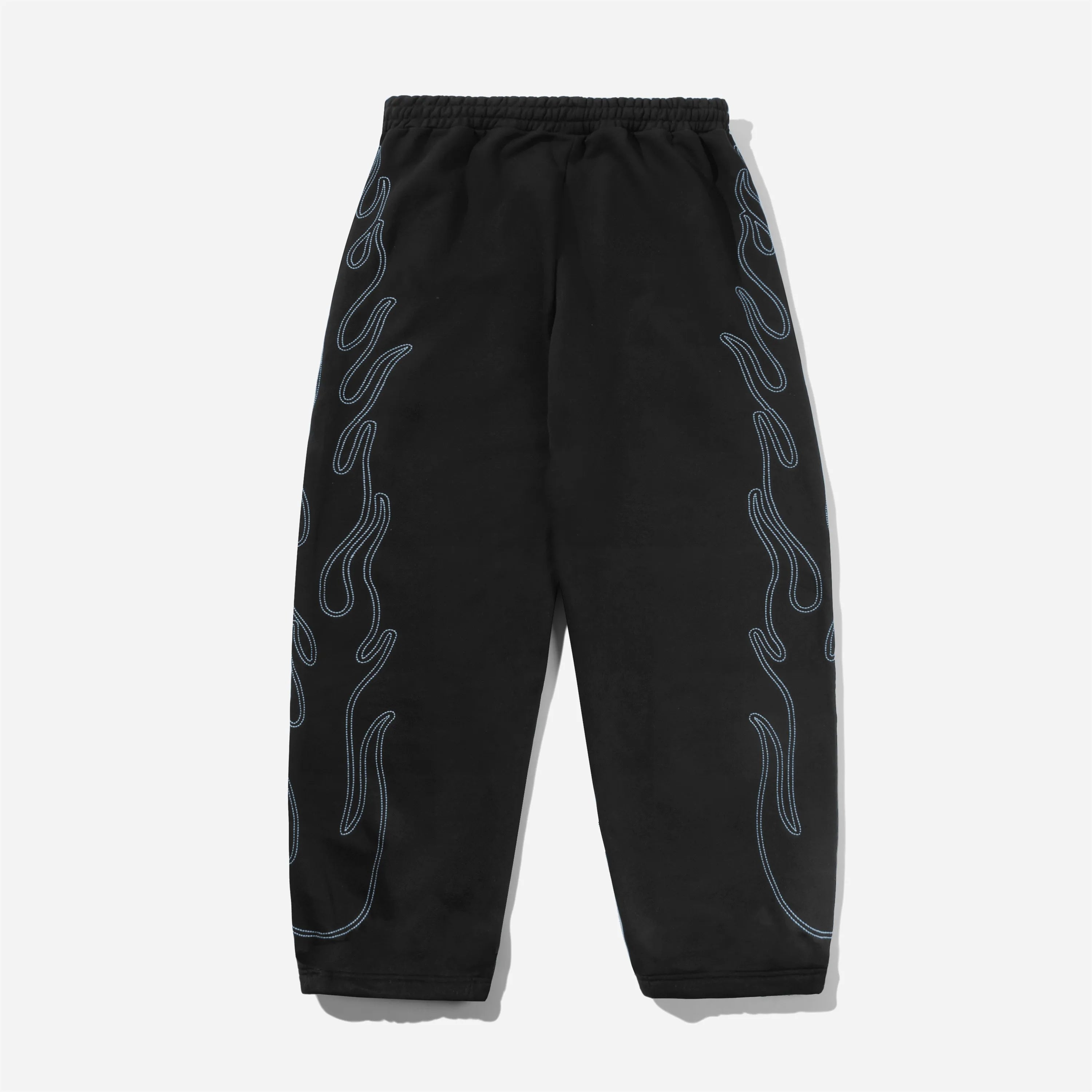 Black Butter Goods Flame Fleece Pants featuring a baggy fit and large light blue flame embroidery.