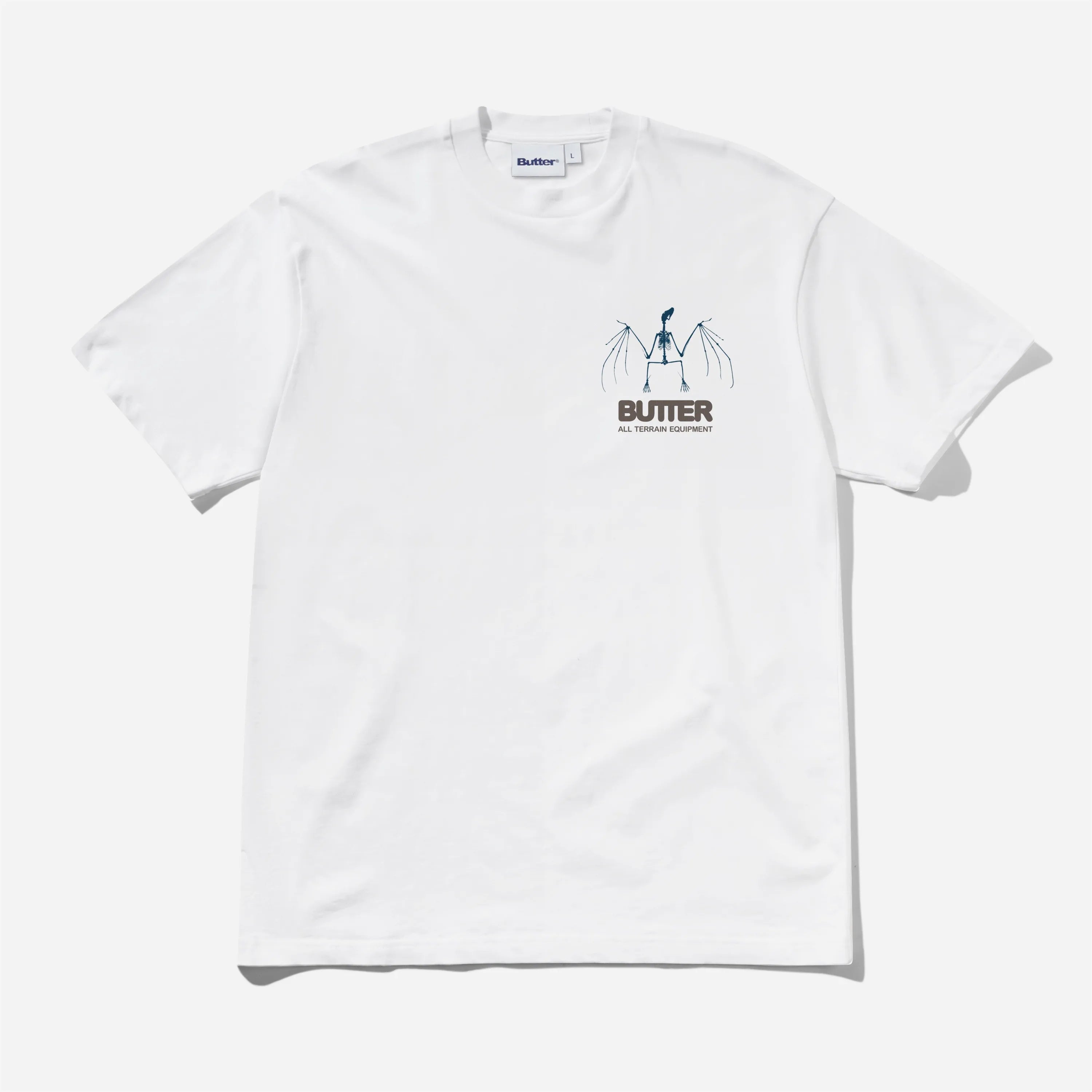 T-shirt manches courtes Butter Goods Nocturnal Tee blanc en coton lourd avec petit logo squelette sur la poitrine.