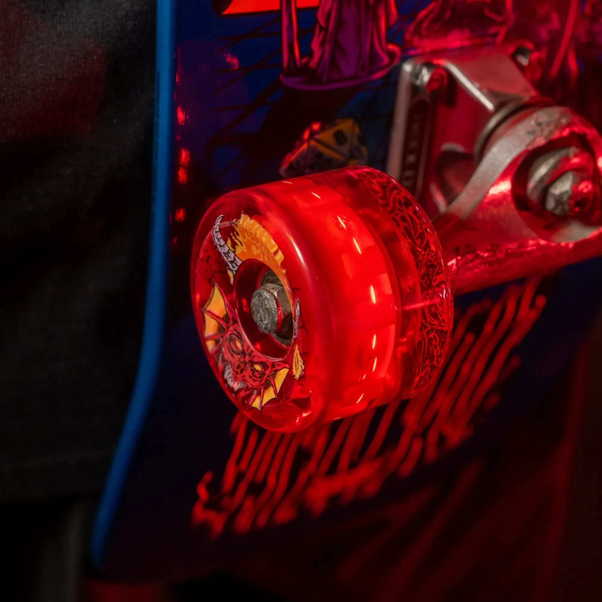 Skateboard wheel that glows red in the dark Slime Balls Light Ups.