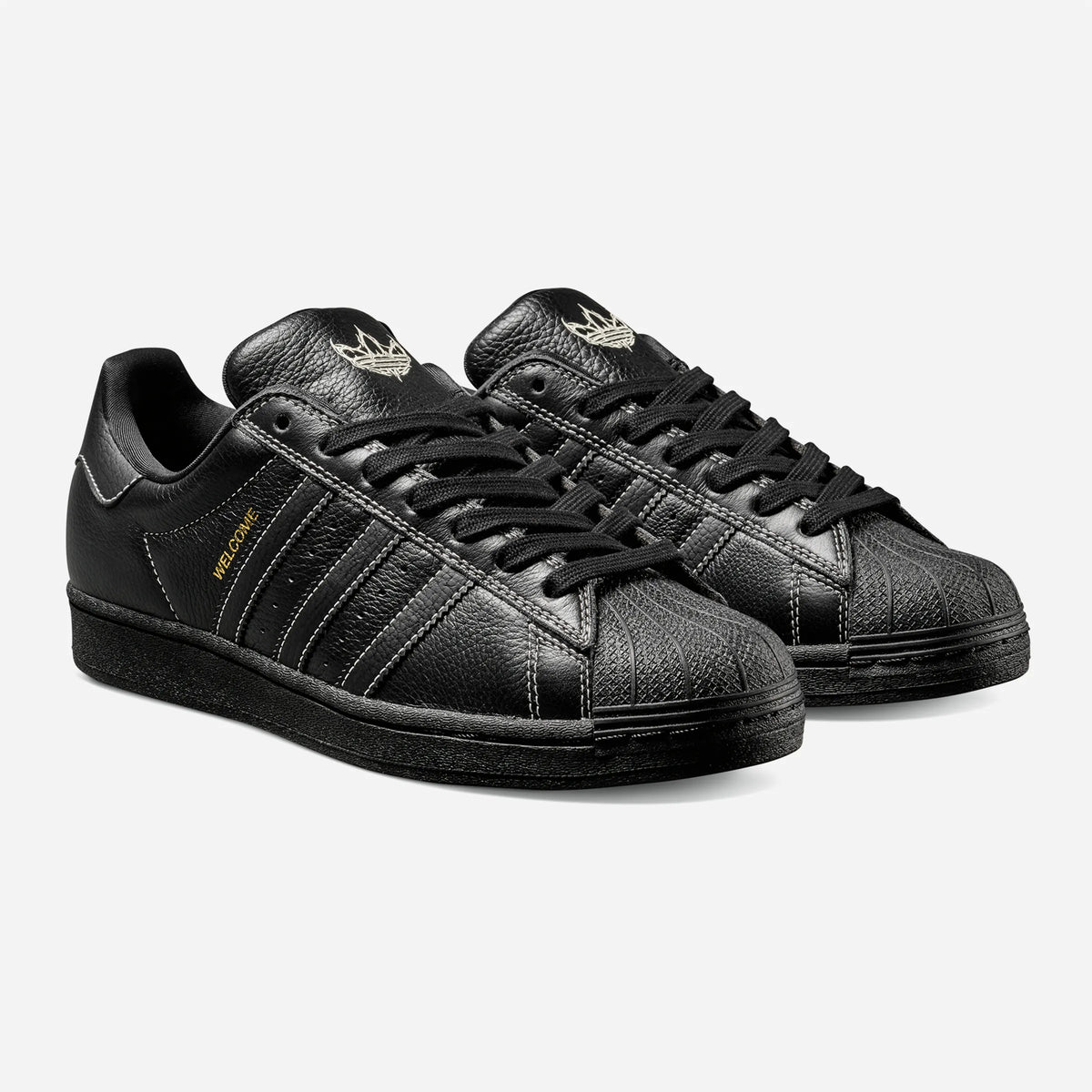Adidas x Welcome Skateboard Superstar ADV Black Black White, sneaker skate basse en cuir noir avec bout en caoutchouc texturé