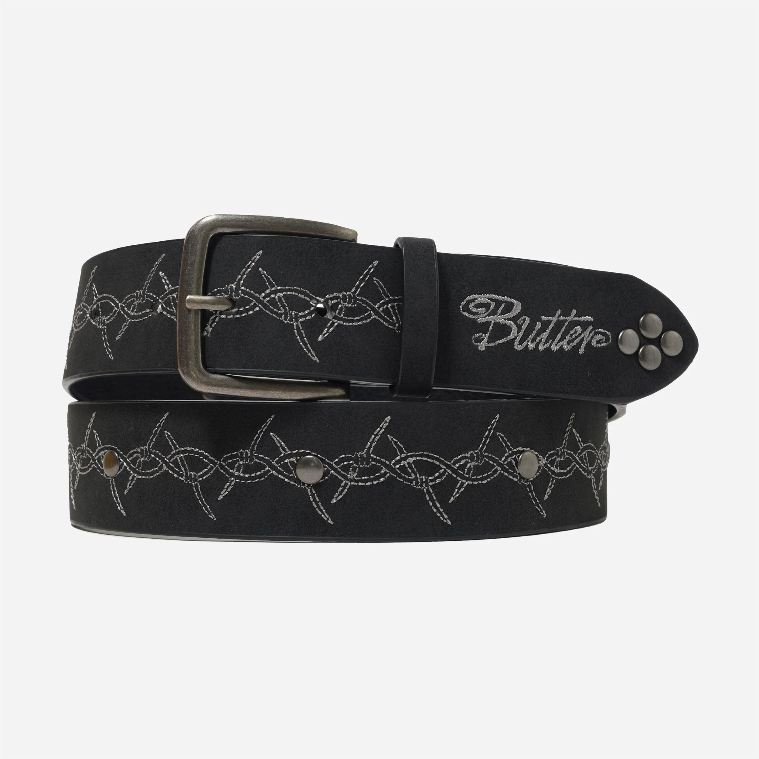 Butter Goods Barbed Wire studded black belt featuring a Western-style metal buckle.
