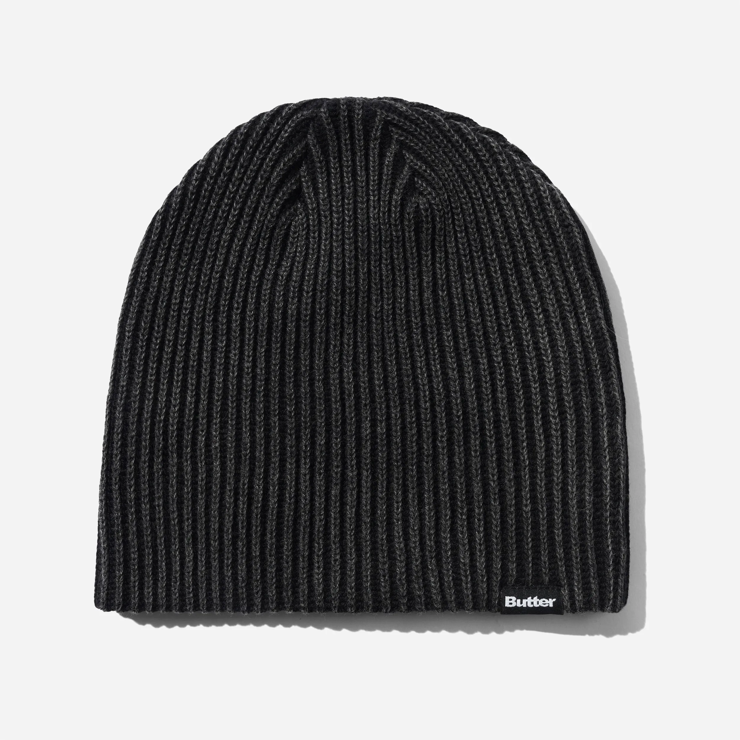 Bonnet Butter Goods Ribbed Skully noir avec maille côtelée et lavage minéral