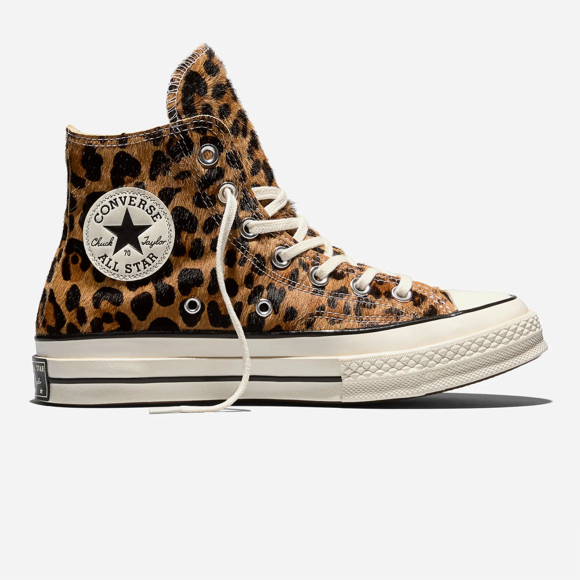 Side profile of the Converse Chuck Taylor 70 Hi Pony Hair leopard print with vintage off-white midsole.