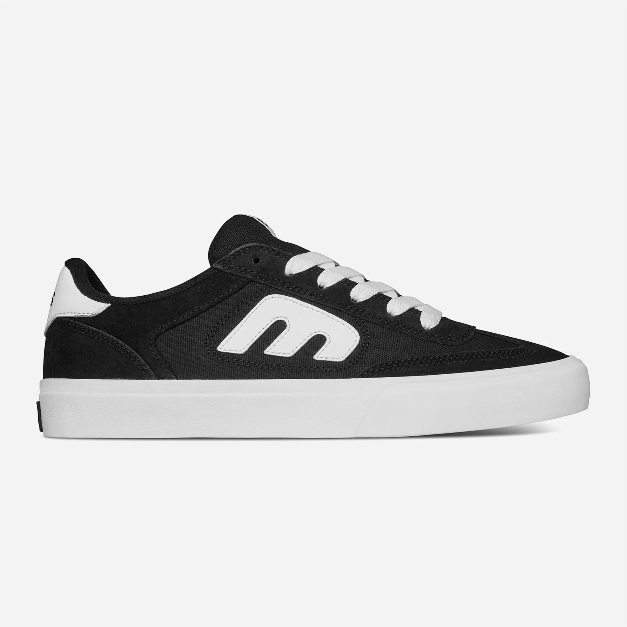 Etnies Locut Vulc Black White, black upper with white accents, side profile