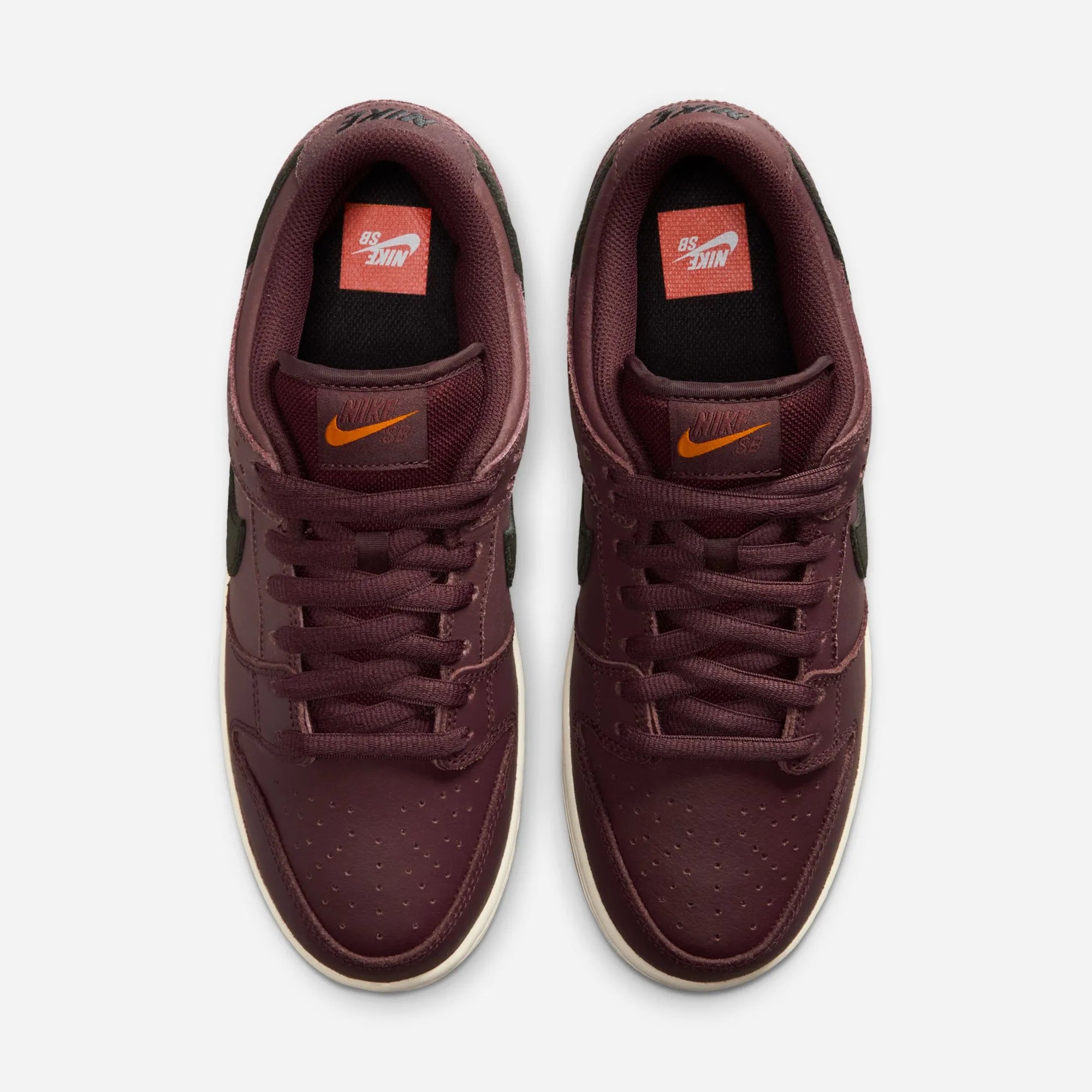 Top view of Nike SB Dunk Burgundy showing the Orange Label logo on the tongue.