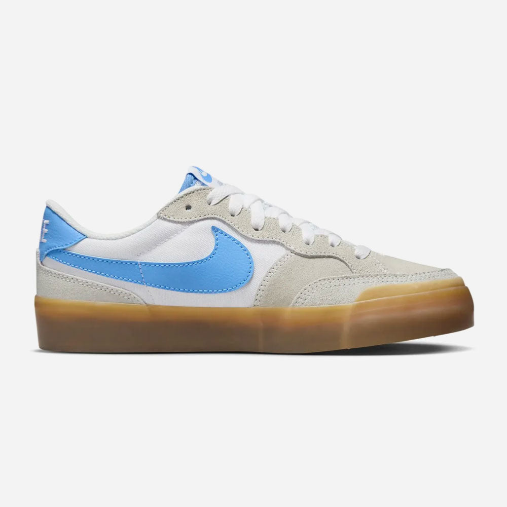Nike SB Pogo Plus skate sneakers in white and sky blue with rubber soles.