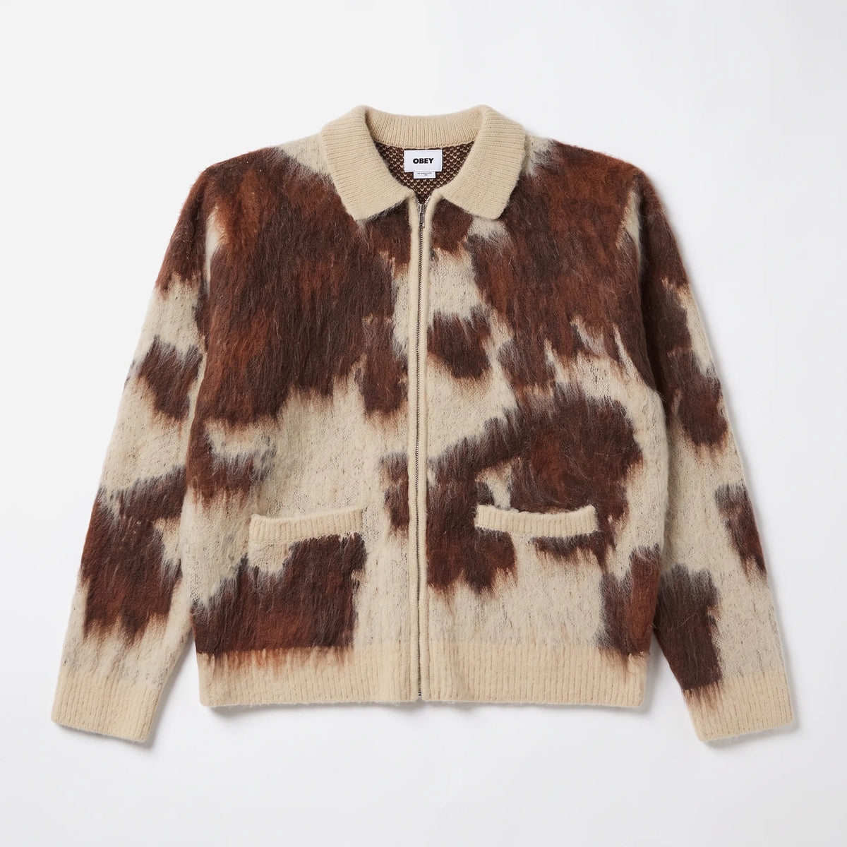 Front view of Obey Cow Pattern Zip Sweater in Cow Multi showing full zip and brushed cow print knit