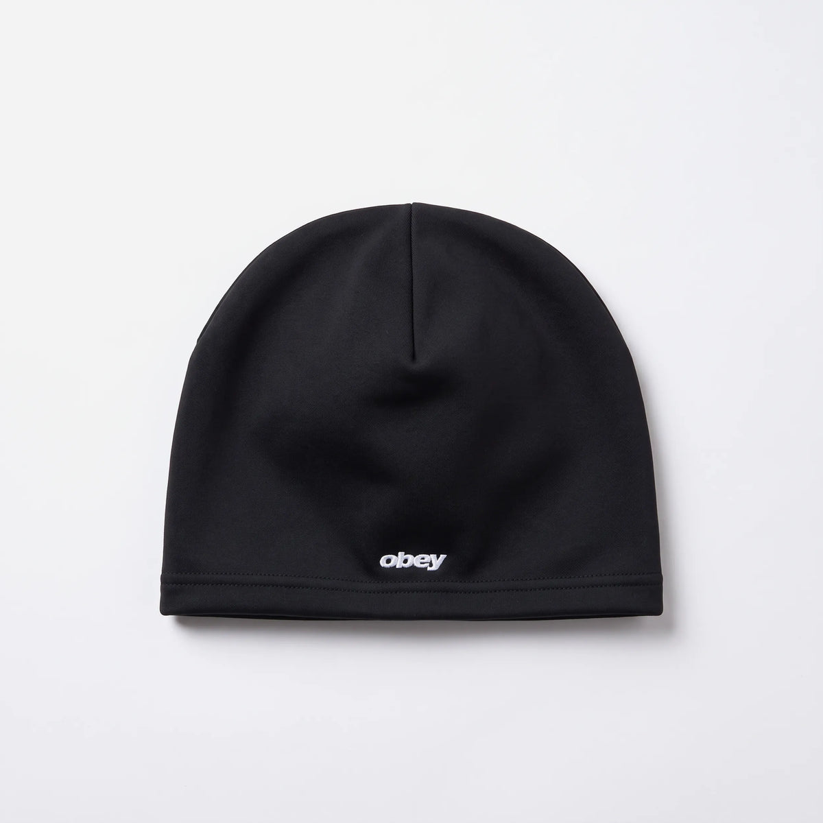 Obey Rova Skull Cap, solid black near-skin beanie with embroidered Obey logo, front view