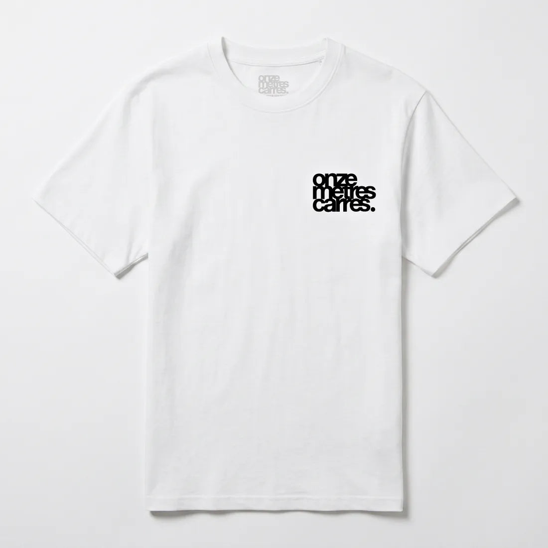 Front view of the white heavyweight cotton Onze Mètres Carrés t-shirt with heart-side logo print.
