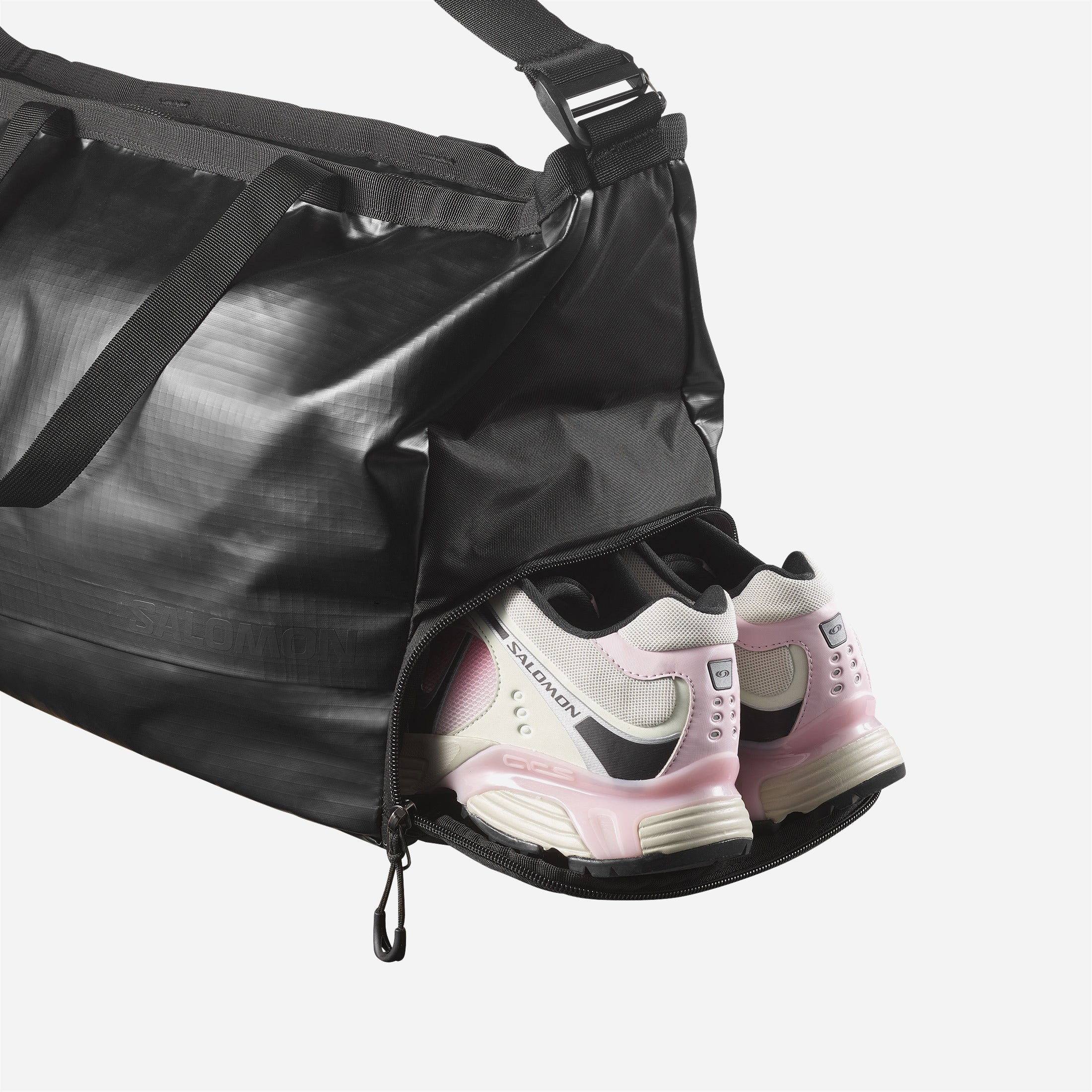 Separate compartment for shoes on the Salomon Extended bag.