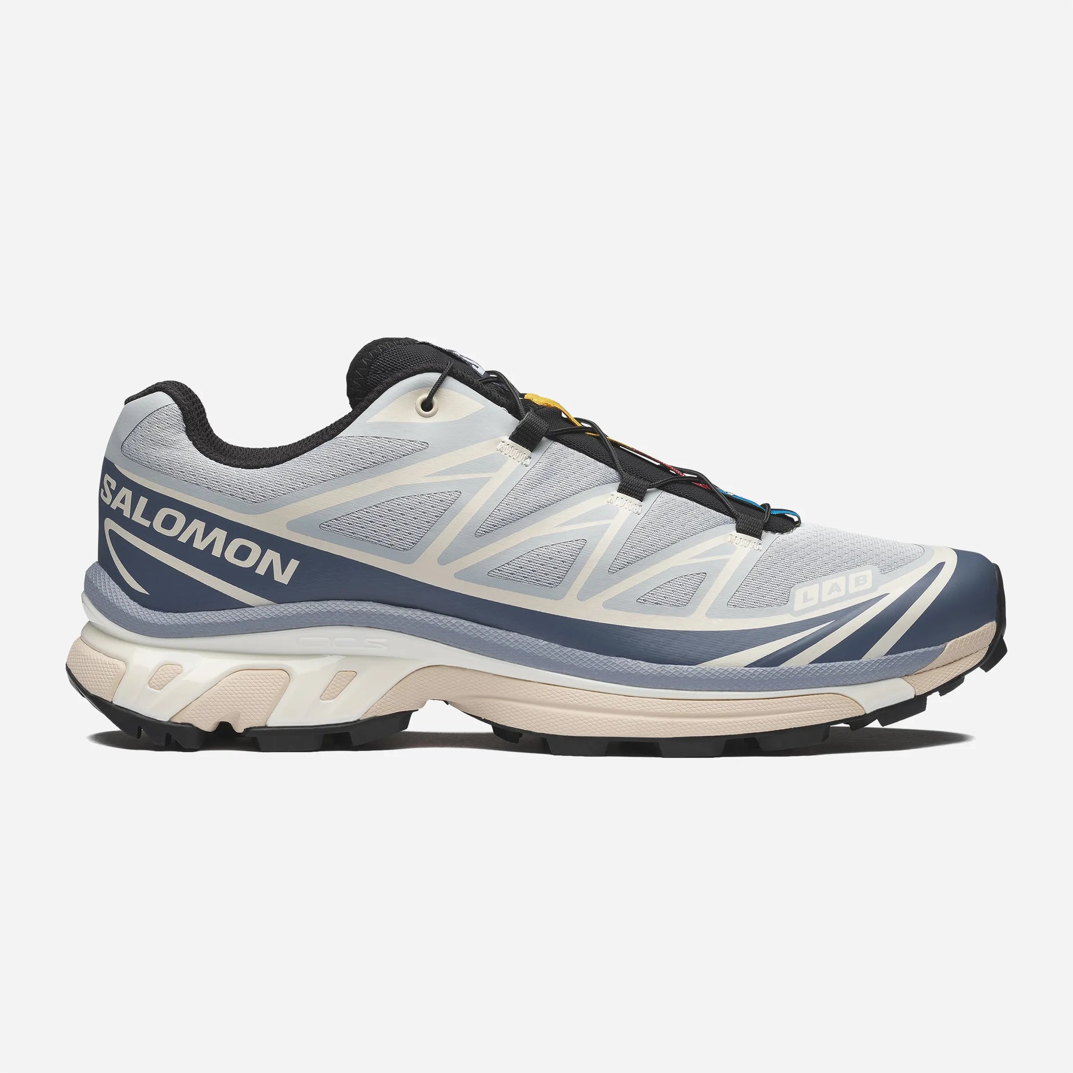 Side profile of the premium Salomon XT 6 Pearl Blue Grisaille sneakers showing synthetic overlays and lugged outsole.