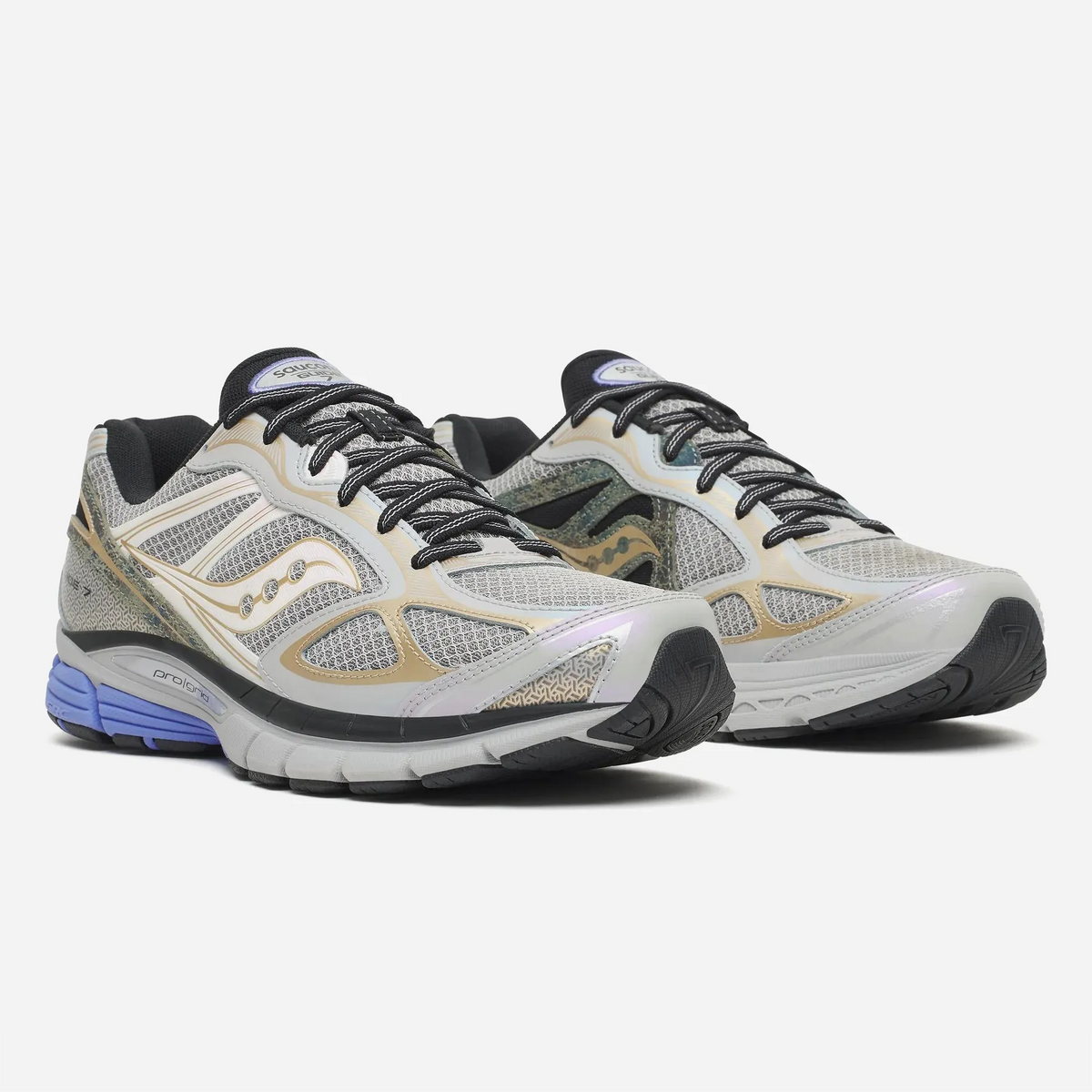 Saucony ProGrid Guide 7 Owl Aureate sneaker, cream mesh upper with satin gold overlays