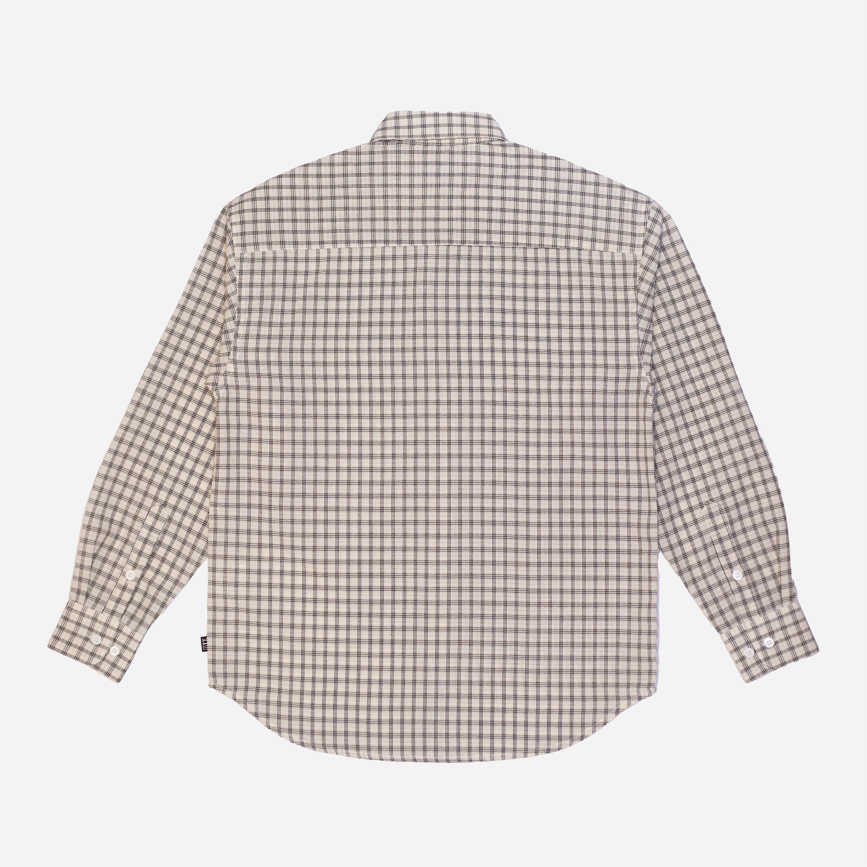 Chemise à manches longues à carreaux fins de la marque Bye Jeremy, modèle Supper Shirt, avec un patch logo papillon noir et blanc sur la poche poitrine.vue de dos