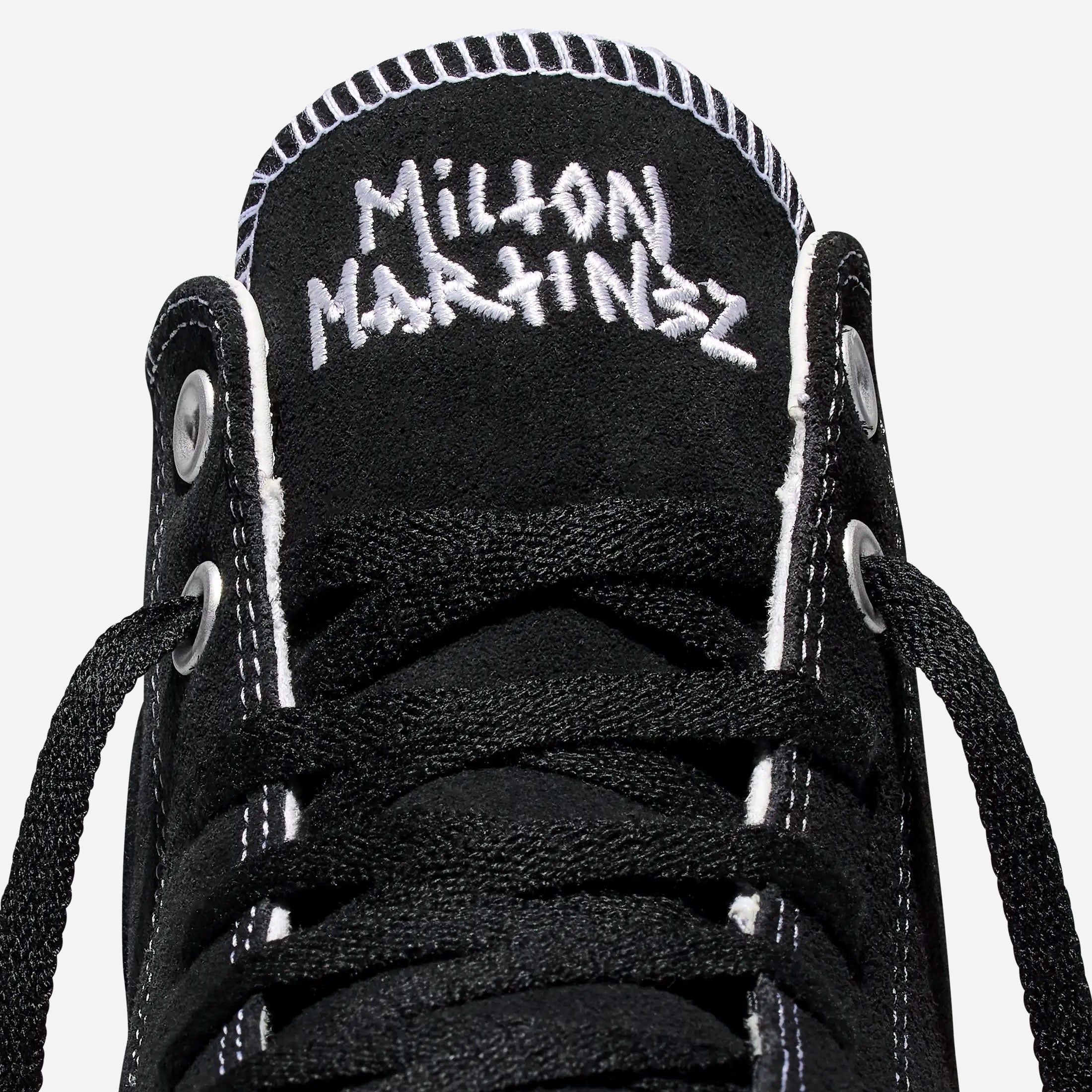 Détail languette Converse Milton Martinez noire