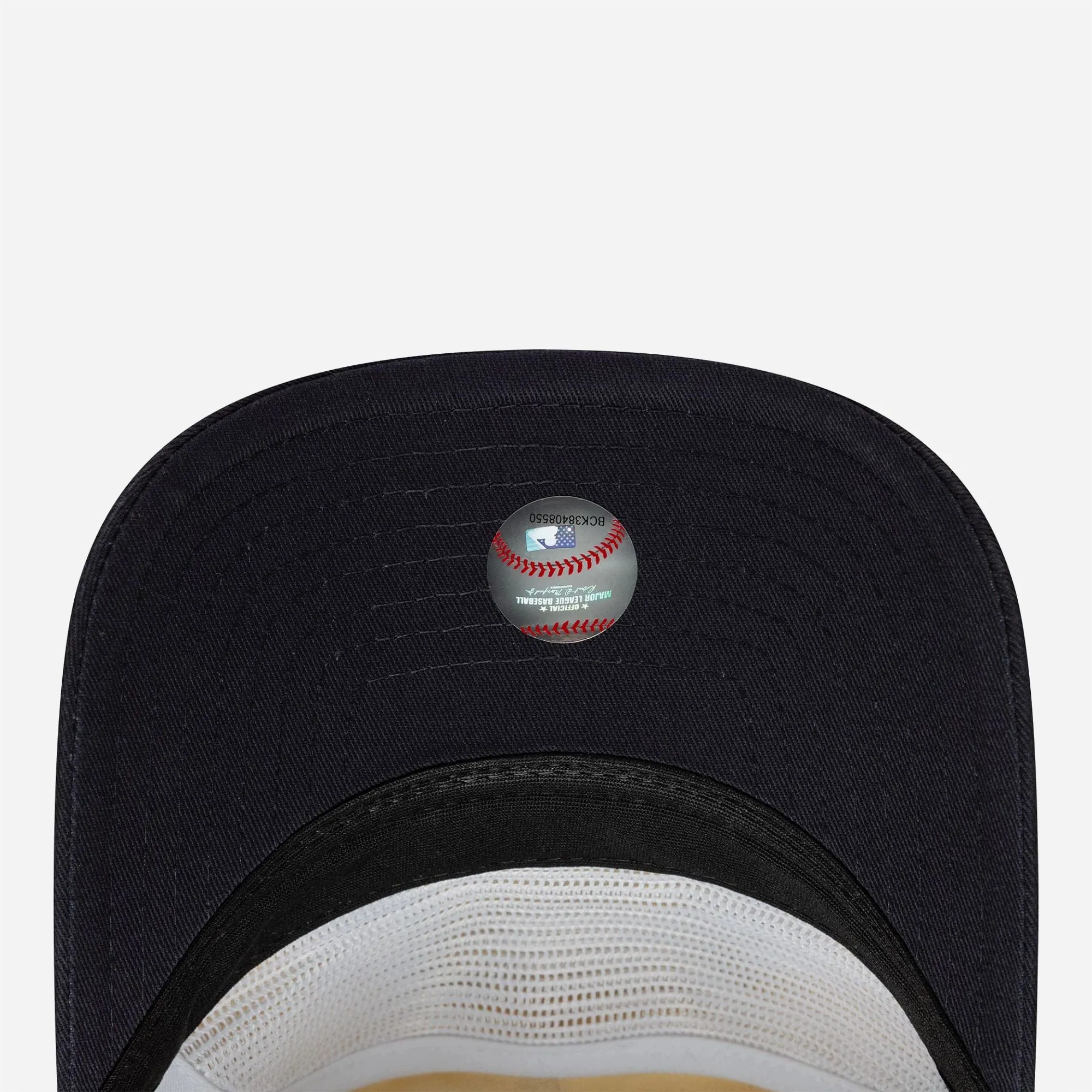 Navy blue visor detail and official MLB label.