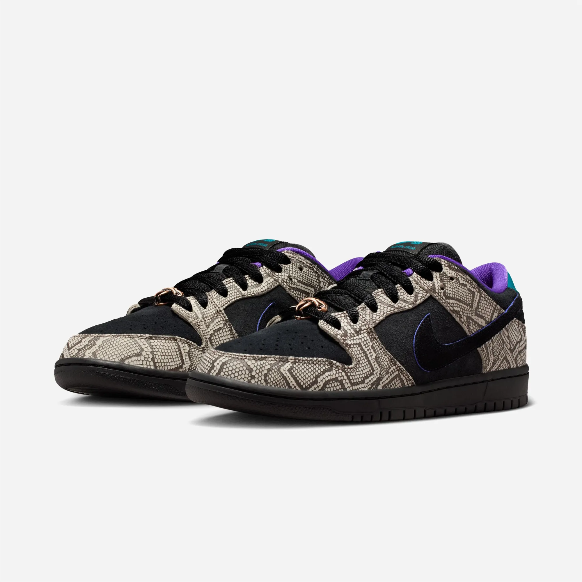 Nike SB Dunk Low Pro Dashawn Jordan Copperhead skate shoes featuring a faux-snakeskin upper and black suede.