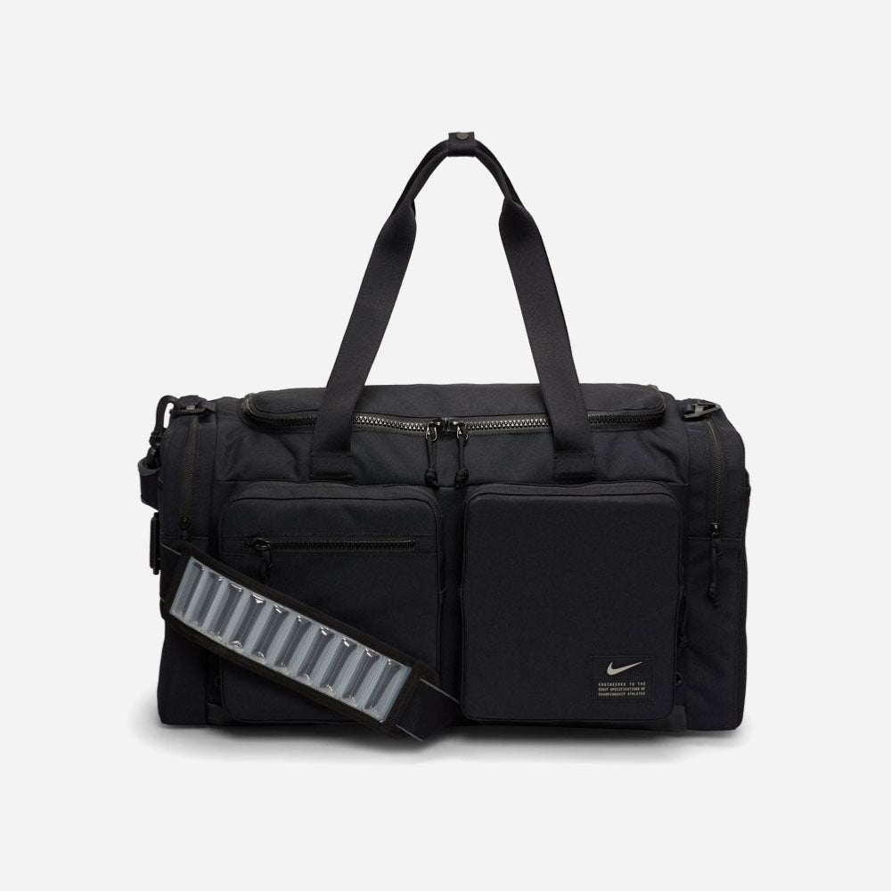 NIKE  - UTILITY M POWER DUFFLE - Black Black Enigma Stone