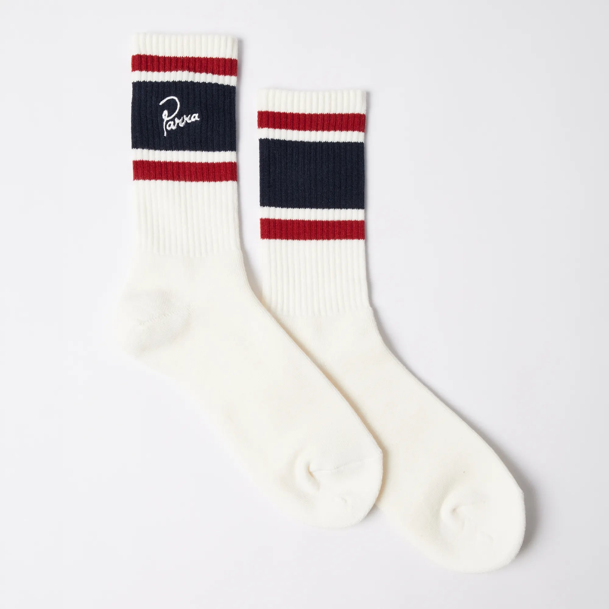 Premium white Parra streetwear socks featuring contrast stripes and signature embroidery.