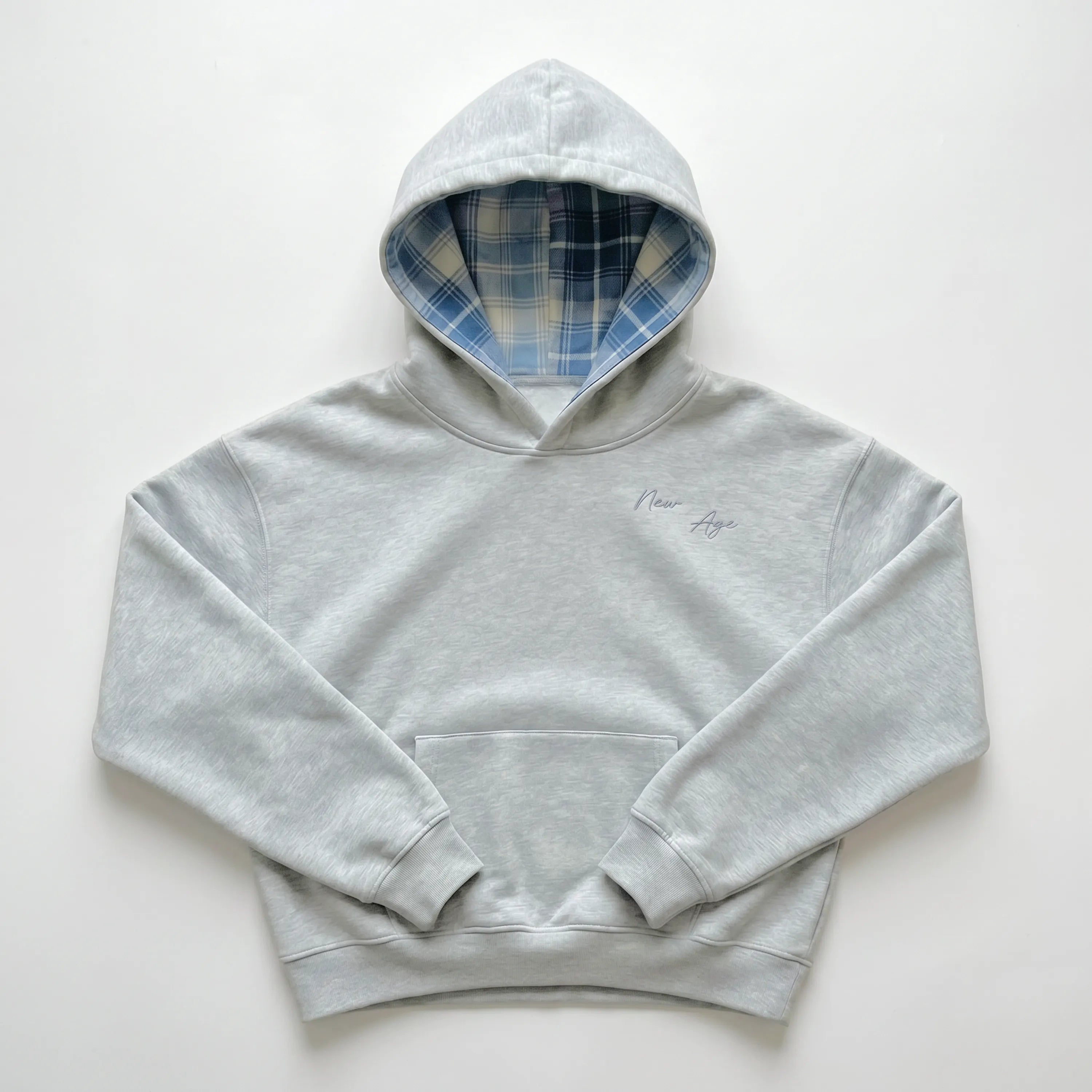 Maison New Age grey hoodie with white embroidery.