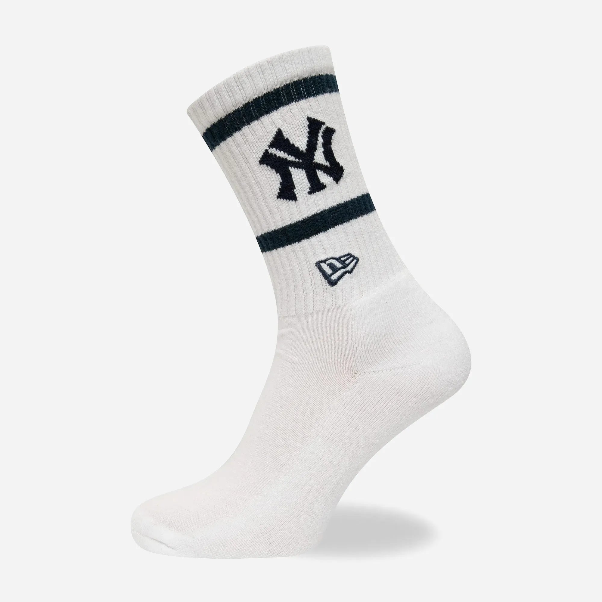 Premium streetwear New Era New York Yankees white crew socks featuring embroidered team logo.
