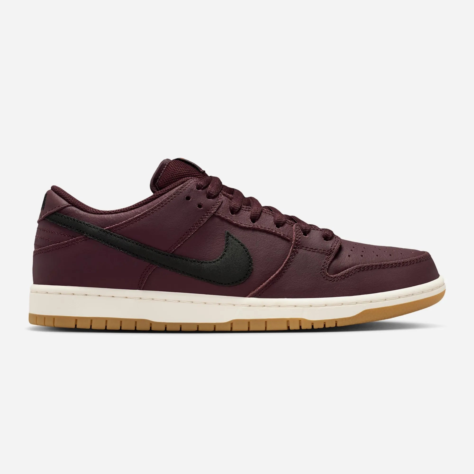 Nike SB Dunk Low Pro ISO in burgundy with grained leather side profile.