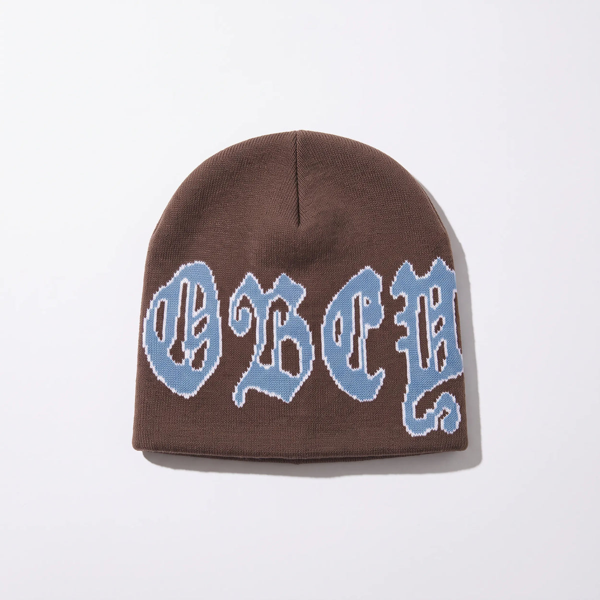 Obey Stina Beanie, dark brown jacquard beanie with blue gothic logo, front view