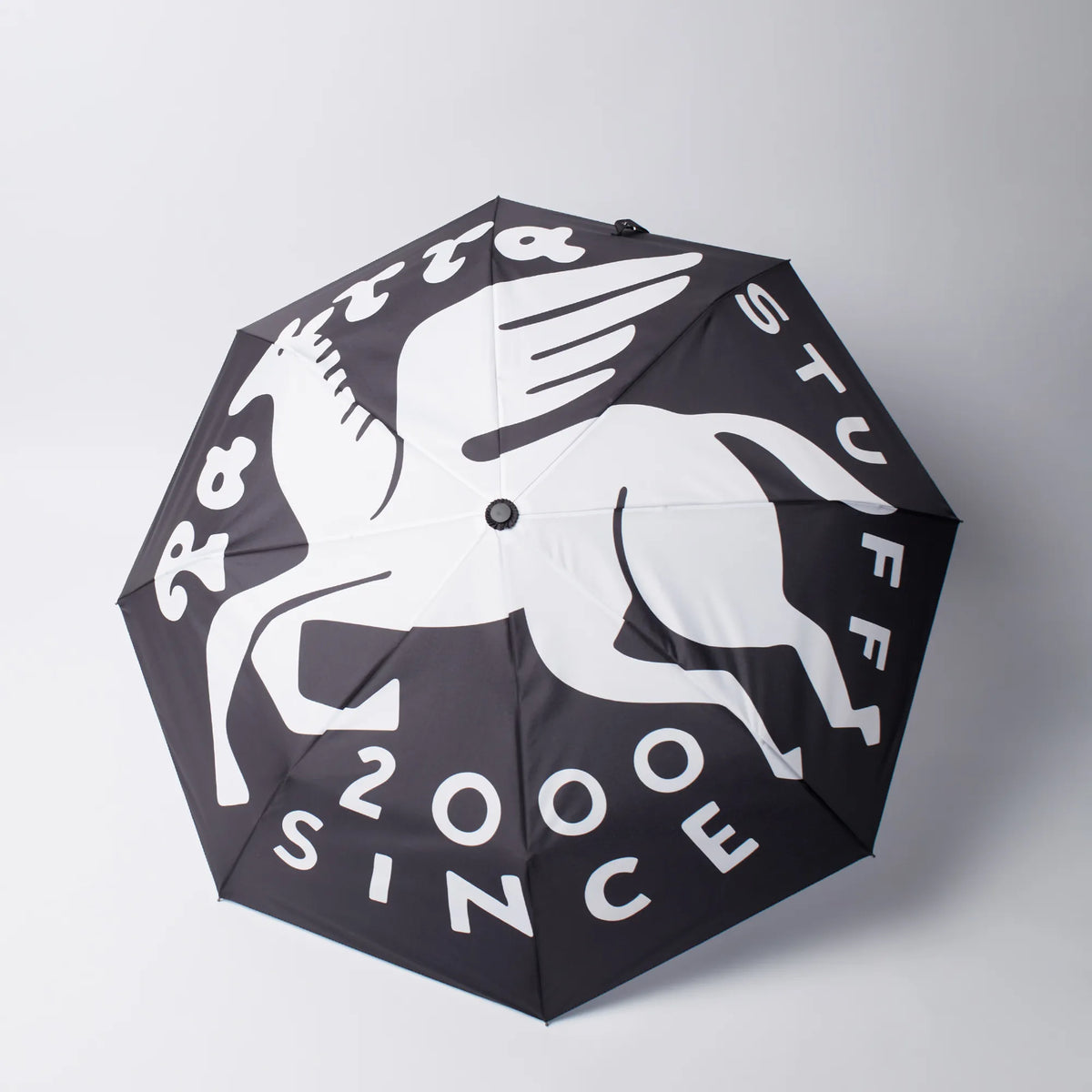 Parra Flying Horse automatic folding umbrella in black with white winged horse print, top view