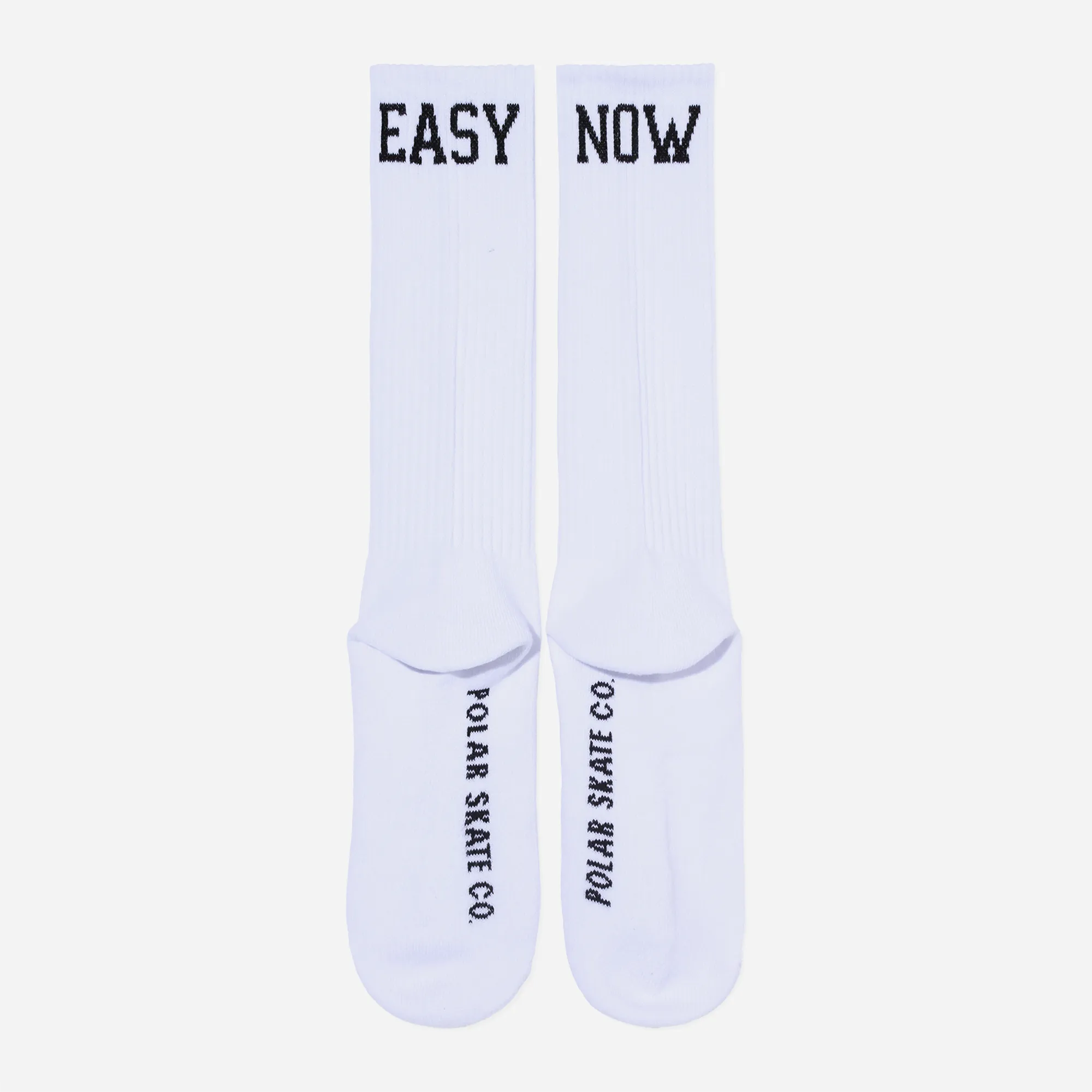 Back view of the woven Easy Now lettering and ribbed knit on Polar socks.