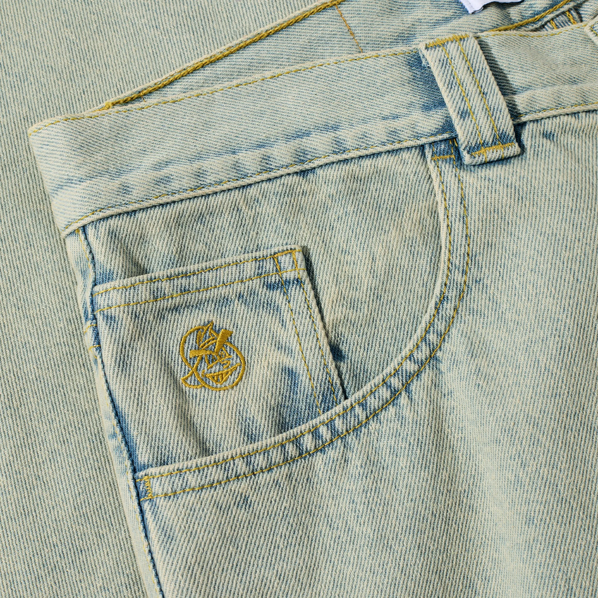 Embroidery detail on the coin pocket of the Polar Skate Co streetwear jeans.