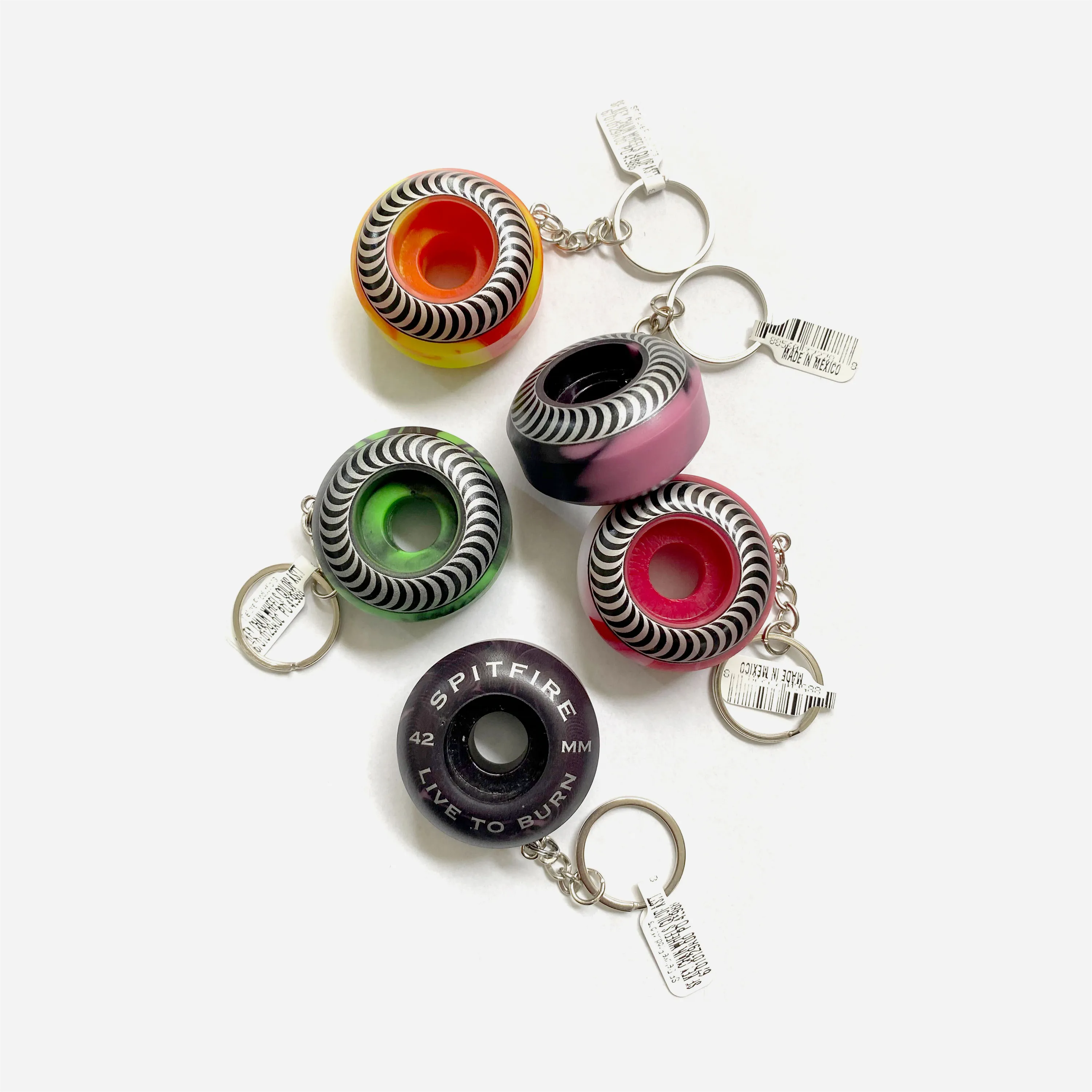Spitfire Wheels keyring, multicoloured marbled swirl design (green, purple, orange, red).