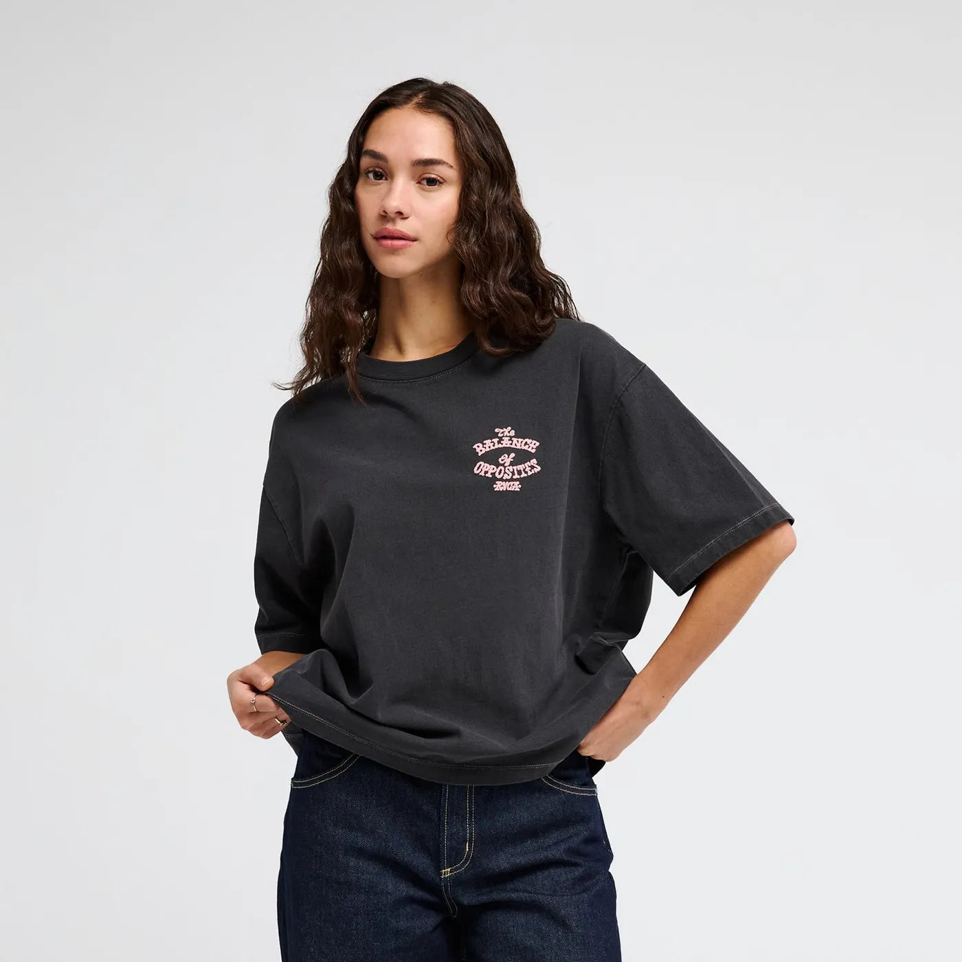 Front view of the RVCA Women's Dalas Snake oversized t-shirt in washed black