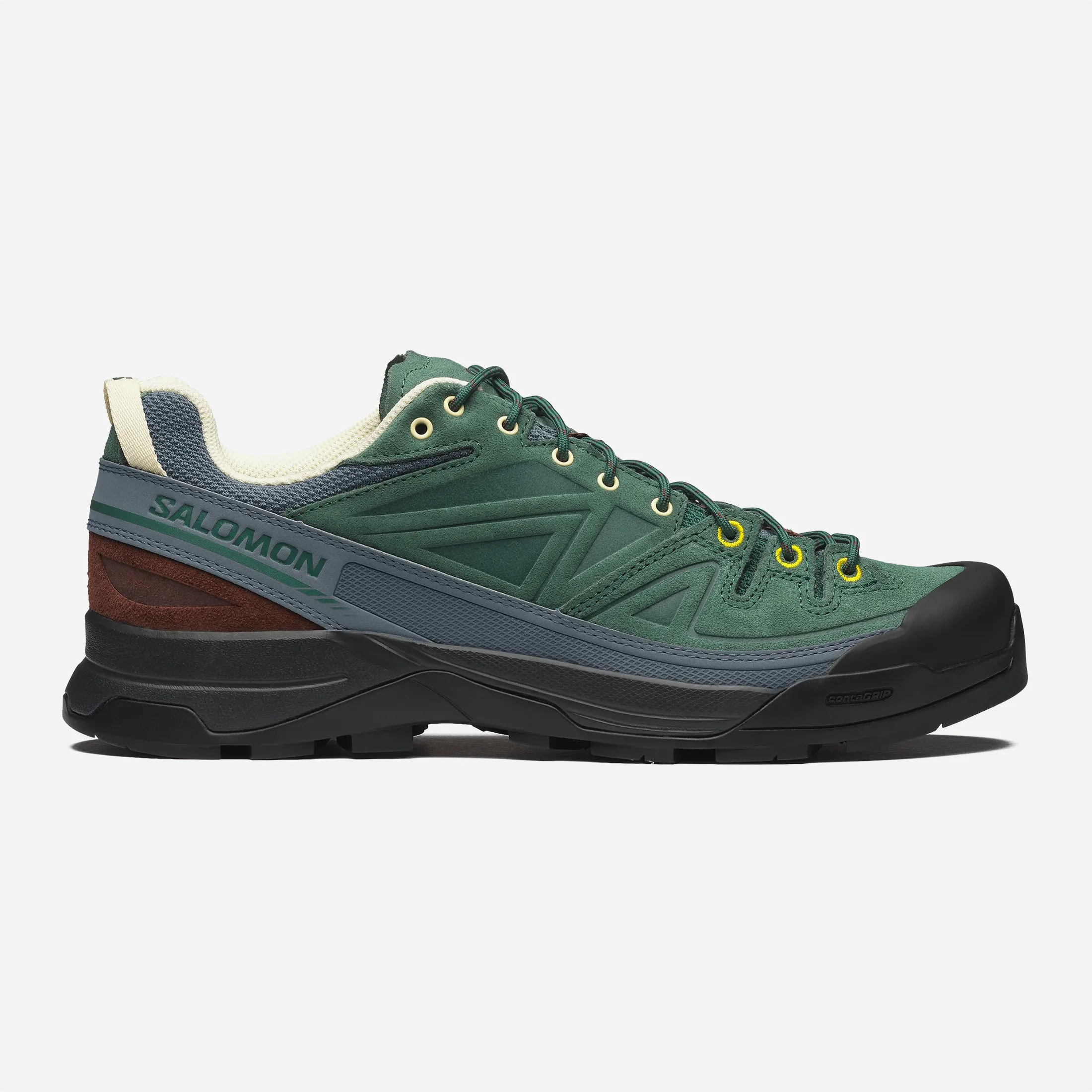 Sneakers premium Salomon X-ALP LTR Bistro Green vue de profil avec détails en daim véritable et semelle crantée.