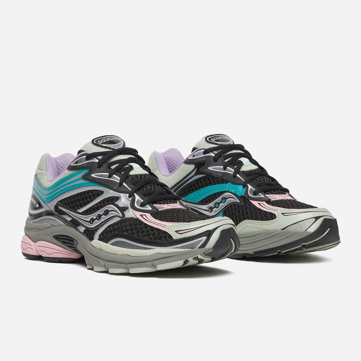 Sneaker Saucony ProGrid Omni 9 OG Black Multi, mesh noir ouvert, overlays argentés et accents turquoise et rose