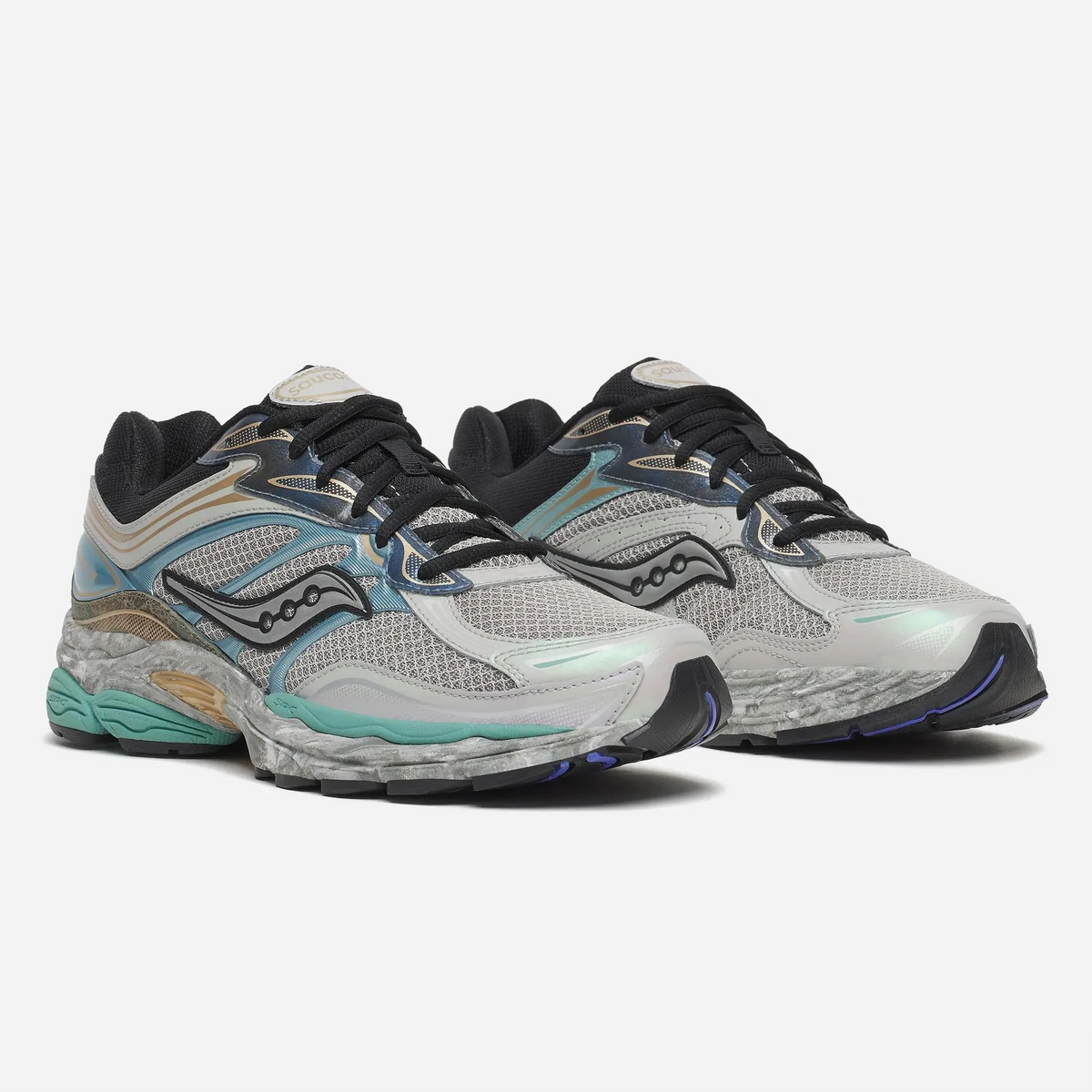 Saucony ProGrid Omni 9 Owl Multi sneaker, stone-grey marble midsole and navy cracked-suede overlays