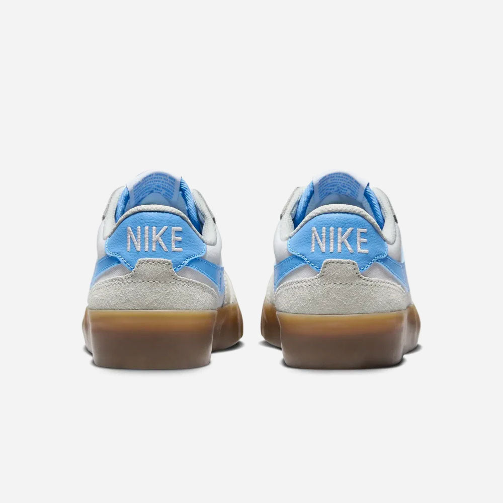 Top view and white lacing Nike SB White Nike SB shoe back with sky blue NIKE embroidery. More.