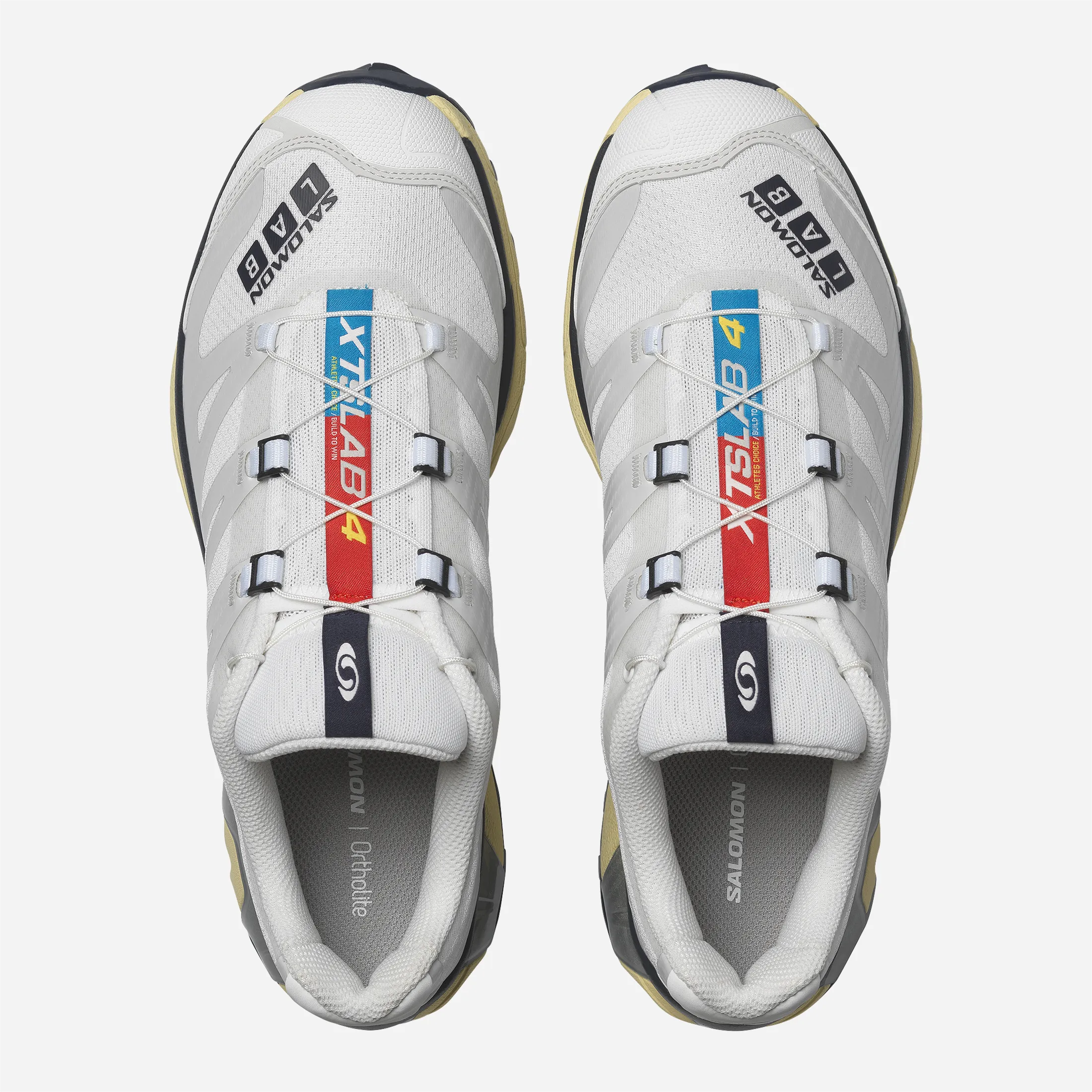 Top view of white Salomon XT-4 with red, blue and yellow LAB logo stripe.