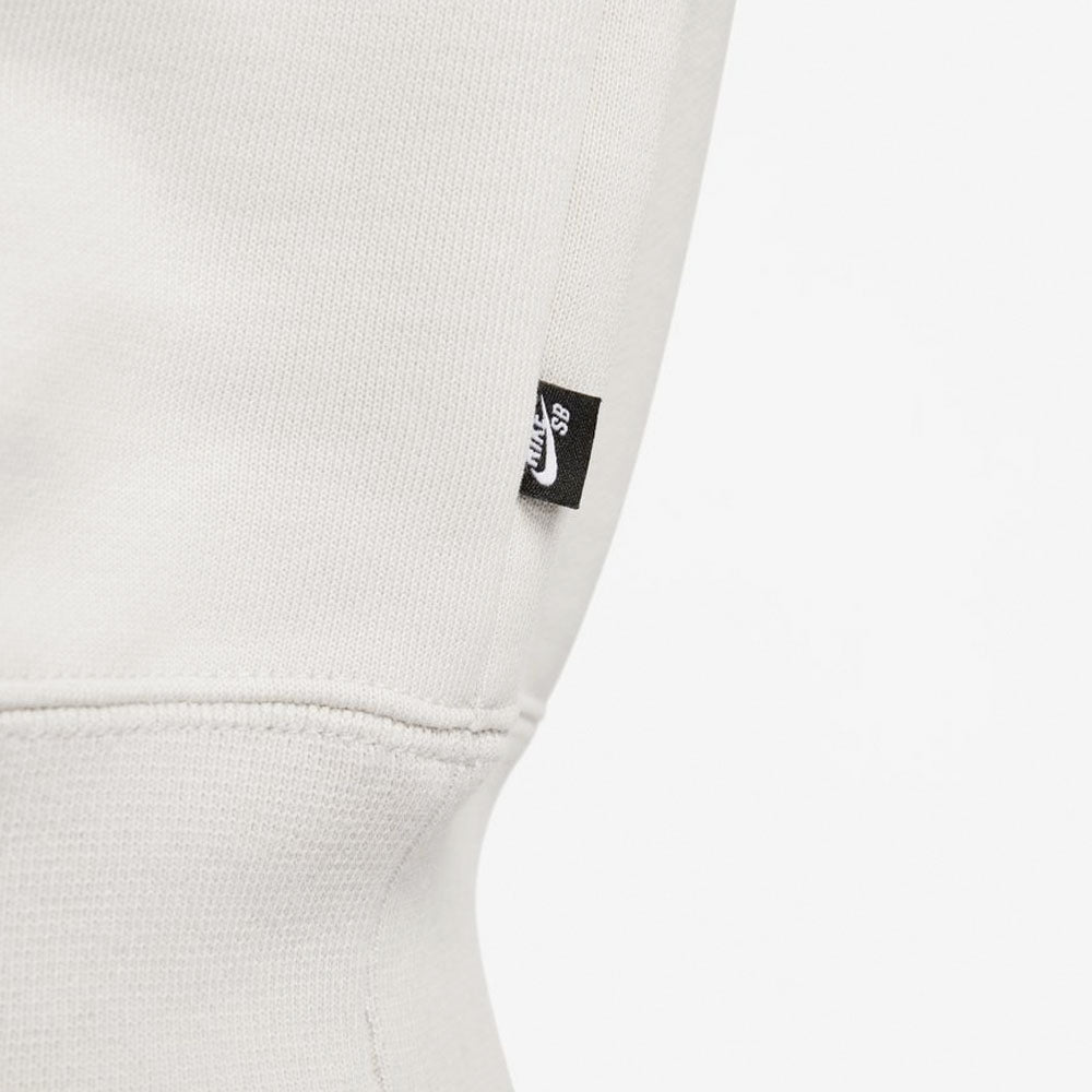 NIKE  - SKATE LIKE A GIRL HOODIE - LIGHT BONE BLACK LT CRIMSON